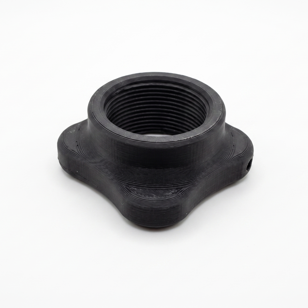 A black plastic threaded adapter or coupler with a four-pointed star-like base, shown on a plain white background.